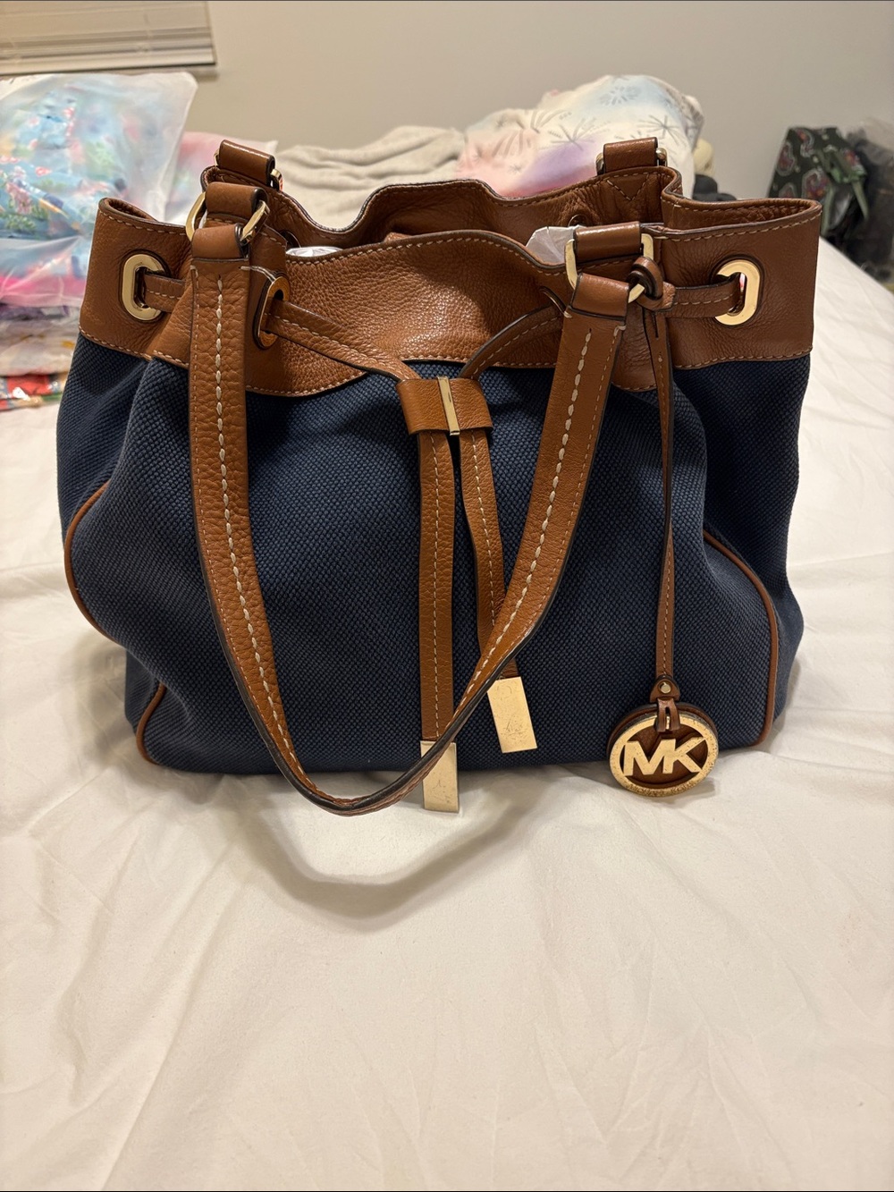 Michael Kors Navy Canvas with Brown Leather Drawstring Shoulder Bag